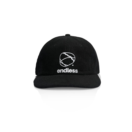 Endless Climbing corduroy cap in black, white embroidered stone and endless logo, front view