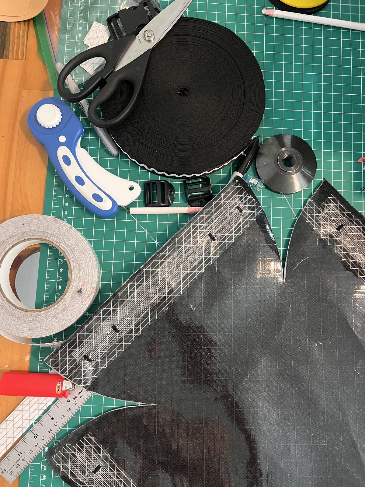 Cutting fabric and hardware on the workshop table